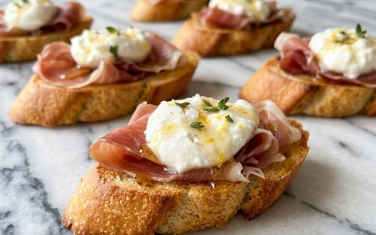 Beef Prosciutto Crostini with Burrata and Lemon Honey Drizzle